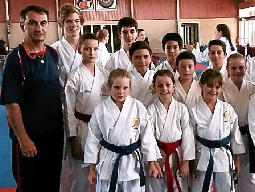 Hamid Mostofizadeh with JKS Australia members. Hamid Mostofizadeh with JKS Australia members.